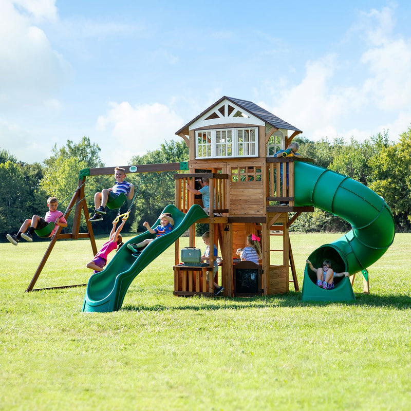 Backyard Discovery Kids' Bristol Point Cedar Wood Swing Set with Swing Beam, Upper & Lower Fort, Rock Wall & Slide Play for up to 11 Kids Q7