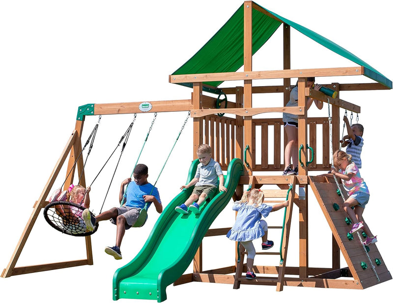 A complete set of wooden mountain-style swings, equipped with a colorful canvas sunshade, a wave slide, a rope swing, a net swing, and a rock wall with climbing ropes and ladders. C7