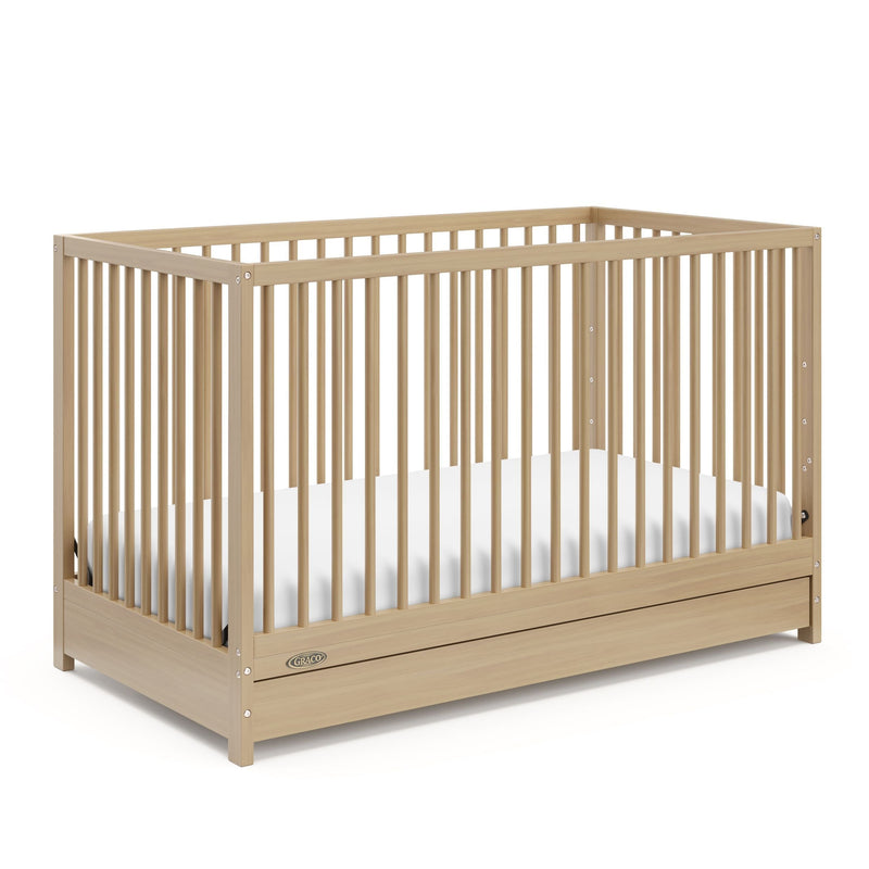 Graco Teddi 4-in-1 Convertible Crib with Drawer, Driftwood Q8